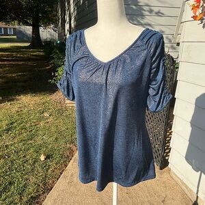 Jennifer Lopez Dark Blue top. Women’s large. Cute sleeves. Has stretch.